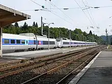 Lyria TGV Sud-Est in original grey and blue TGV livery. Please note the red band and Lyria logo.