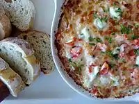 Close-up view of the same crab and lobster dip