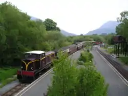 Down train arriving at Waunfawr from Rhyd Ddu, powered by diesel locomotive "Castell Caernarfon" on 26 May 2004