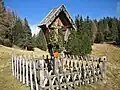 Wayside cross on the Salten in Vöran, South Tyrol, Italy.