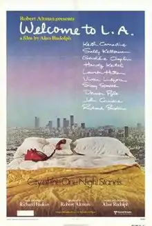 A distant cityscape, a bed with a red telephone the receiver on the pillow, and the tagline "The city of the one night stands"