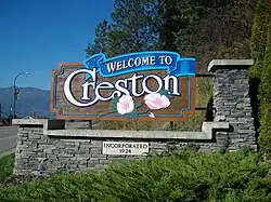 Creston's eastern town limit welcome sign on Highway 3.