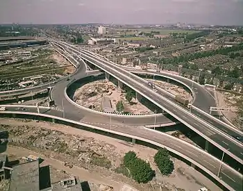 Image 42The newly constructed junction of the Westway (A40) and the West Cross Route (A3220) at White City, circa 1970. Continuation of the West Cross Route northwards under the roundabout was cancelled leaving two short unused stubs for the slip roads that would have been provided for traffic joining or leaving the northern section.