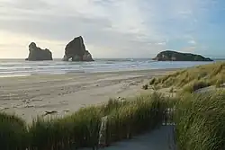 Wharariki Beach and three of the Archway Islands