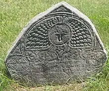 Hexafoils featured prominently on a Colonial New England gravestone carved by Obadiah Wheeler in Franklin Connecticut.