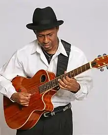 Ian Villafana playing a Solitaire guitar