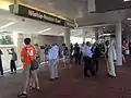 Passengers await the arrival of the second Silver Line train from Wiehle–Reston East on its first day of service