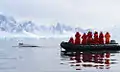 A tourist Zodiac has a close encounter with a humpback whale in Wilhelmina Bay