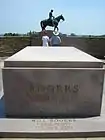 Will Rogers' tomb below statue