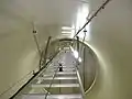 Ladder providing access to the nacelle of a wind turbine in Lower Austria. Photo taken following an inspection. The view is from bottom to top, showing the safety rope for the climb