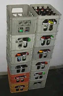 Reusable water bottles in crates