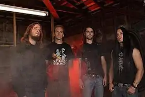 World Under Blood's original lineup, from left to right: Deron Miller, Luke Jaeger, Risha Eryavec, and Tim Yeung.