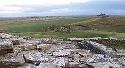 Wyre, viewed from Cubbie Roo's Castle, with the ruined chapel and burial ground visible.