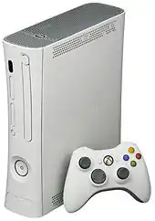 Xbox 360 Arcade console with white wireless controller.