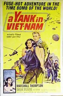 The foreground presents a blond man in a yellow suit carrying a young brunette woman in a purple robe. In the background, on the left, there is an explosion surmounted by helicopters; on the right, two armed men are running. Above this, "A Yank in Viet-Nam" is written in large red letters, with a smaller-written mention : "Actually filmed under gun fire!". At the top of the poster, the tagline "FUSE-HOT ADVENTURE IN THE TIME BOMB OF THE WORLD" is written in large black letters.