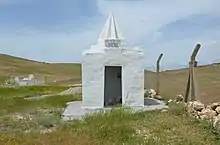 Yazidi temple in a cemetery in Cinerya