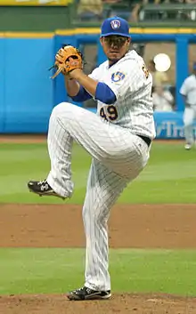 A baseball player in white