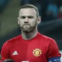 Rooney in a football kit