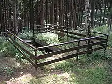 Zemlyanka used by partisans near Nýrov, Czech Republic, preserved as a WWII memorial