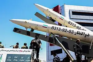 Two Zolfaghar missiles mounted on a launcher